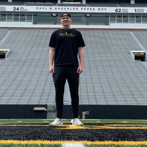 Zach Ortwerth Commits to Iowa Buckeyes while wearing one of our Total Domination Iowa T-shirts