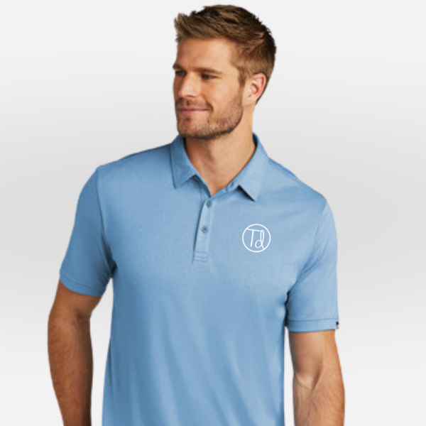 Total Domination golf polo is a Travis Mathew branded polo